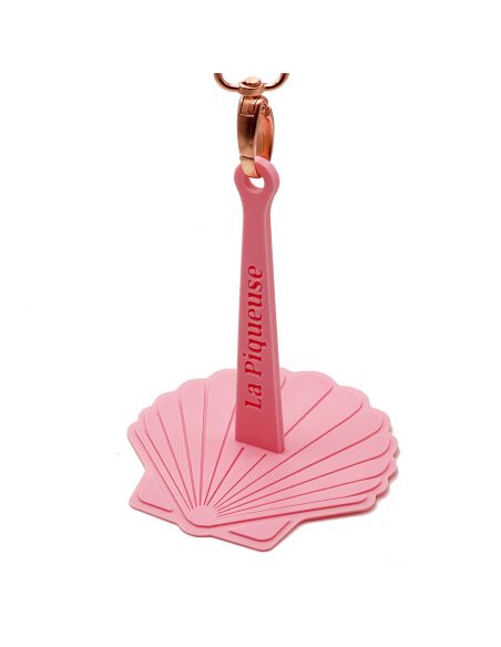 Déroule-pelote nomade avec dragonne rose